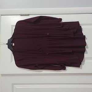 Woman's burgundy button embellished sweater with pockets